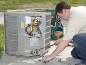 a-technician-preparing-to-install-a-new-AC-unit